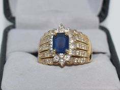 Vintage Estate Jewelry, LeVian Blue Sapphire & Diamond Ring in 18k Yellow Gold, Engagement Ring, Beautiful!  Note: gently used condition Sapphire & diamond ring in 18k yellow gold signed by LeVian with approximately 2 carat Sapphire and approximately 1 carat in G-H color, VS clarity diamonds Total weight - 11.15 grams Ring Size - SEE PHOTO Prong Setting  Being Sold As Is Being sold as is. Please email me with any questions You have the option to select gift wrapping at the checkout. If you have Levian Jewelry, Blue Sapphire Diamond Ring, Yellow Gold Engagement Ring, Gold Sign, Blue Sapphire Diamond, Yellow Gold Engagement, Sapphire Diamond Ring, Gold Engagement Ring, Gold Engagement