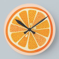 an orange clock with black hands on a white background and the words citrus written below it