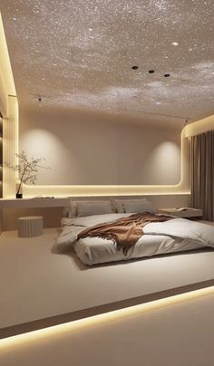 a large bed sitting in the middle of a bedroom next to a wall mounted tv