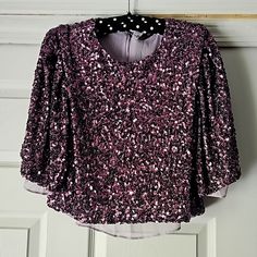 Gorgeous Sequined Top, Design By Endless Rose__ *Features Scoop-Neckline, Sheer Gauze Lining, Short Flutter Sleeves With Soft Pleating At The Shoulder Top, And Sequins All Over! *Size Xs, Relaxed-Fit, Eggplant Purple Color With Lavender Colored Lining *100% Polyester, Exclusive Of Sequins. Made In China. *Brand-New With Original Tags On. *Contemporary Style, Perfect Over-Layer For A Simple Gown Or Dress, Works Well With High Waist Palazzo Pants, Appropriate For Wedding/Formal Wear. Reach Out Wit Purple V-neck Top For Evening, Elegant Pink Tops For Party Season, Pink Sequined V-neck Top, Pink V-neck Tops For Party, Fitted Purple Blouse For Party, Elegant Short Sleeve Crop Top For Party, Elegant Short Sleeve Party Crop Top, Purple Stretch Blouse For Party, Purple Short Sleeve Top For Party