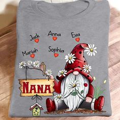 Lovelypod - Personalized Shirt, Nana Gnome Valentine'S Day Matching Family Gifts For Grandma Shirt available in T-shirt, hoodie, tank top, longsleeve, multi color and size S M L XL XXL 3XL 4XL 5XL. Shipping from the US. Easy 30 day return policy - Shop now! 6.1-ounce, 100% cotton .Double-needle neck, sleeves and hem; Roomy Unisex Fit. Ash is 99% cotton, 1% poly; Sport Grey is 90% cotton, 10% poly; Dark Heather is 50% cotton, 50% polyester .Decoration type: Digital Print. Made by Gildan Cartoon Costumes, Nana Shirts, Gnome Gift, Grandma Shirts, Personalized Hoodies, Flower Shirt, Family Kids, Grandma Gifts, Personalized Shirts