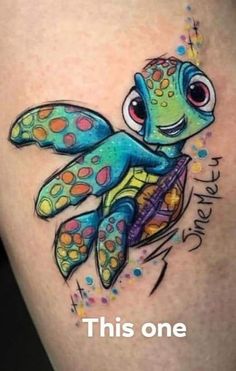 a tattoo with an image of a sea turtle on it's thigh that says, this