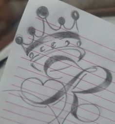 a drawing of a crown on top of a piece of paper