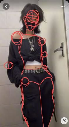 a woman standing in front of a bathroom mirror with red lines drawn on her body