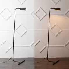 two floor lamps in front of a white wall