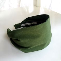 "Green Organic cotton fabric headband extra wide fitted aliceband hairband neutral hair band gift for her olive green This luxurious and yummy solid green headband makes a striking yet subtle fashion statement. Totally mod in style. Sophisticated and glamorous. Roughly 3.25\" wide. This headband is sturdy and comfy to stay in place all day long. Great for the office or date night or for busy moms play dates in the park. Great for short pixie hair cuts too! Made to order. Fabric is 100% certified Luxury Headbands, Green Headband, Cotton Headband, Green Girl, Black Headband, Fabric Headbands, Handmade Headbands, Organic Hair, Wide Headband