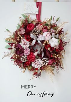 a christmas wreath hanging on the wall