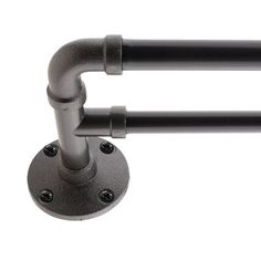 two black metal pipe holders on a white background