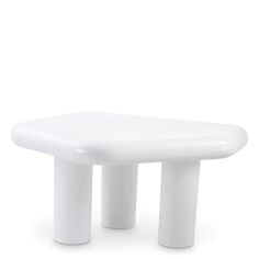 two white stools sitting next to each other on top of a white flooring