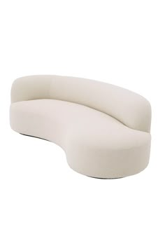 the curved sofa is made out of foam