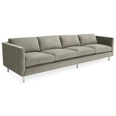 a gray couch with metal legs on a white background