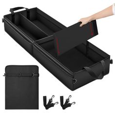 an open suitcase with straps and handles on the bottom is being held by someone's hand