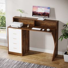 Enhance your workspace with this versatile computer desk, featuring an elevated monitor stand for optimal sight, comfort and posture, and five spacious drawers for neatly storing essentials. Desk In Bedroom Master, Two Monitor Desk, Two Monitor Desk Setup, Two Monitor Desk Setup Office, Monitor Desk Setup, Desk Setup Office, Desk In Bedroom, Desk With Monitor Stand, Computer Desk With Drawers