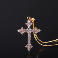 This stunning Brass and Zirconia Christian Cross Necklace for Women makes a perfect addition to a believer's wardrobe. Made with brass and cubic zirconia, it shines brightly and will add elegance to whatever you choose to wear. Among believers who know at least a thing or two about our Lord and Savior, Jesus Christ, this is a great accessory to compliment any outfit.Choose which color of the cross you prefer. Perhaps go for all four options to complete the collection. Additional Product Specific Christian Cross Necklace, Jewelry Accessories Ideas, Neck Jewellery, Jewelry Lookbook, Cross Jewelry, Girly Jewelry, Stunning Necklace, Dream Jewelry, Pretty Jewellery