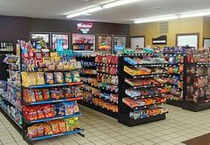 the inside of a grocery store filled with lots of food