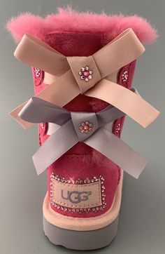 Brand: UGG Australia Condition: New with Box - Buyer will receive boots and box displayed in listing pictures. Model: UGG BAILEY BOW II boots Embellished with beautiful Swarovski Crystals Style: #1017394T Color: PINK AZALEA/ICELANDIC BLUE Swarovski Color:- Rose- Light rose- Material: Water resistant Suede TODDLER Size: US8 T see pictures for measurements All merchandise is guaranteed authentic. See left boot inside tag -size labels have been marked to prevent store returns! ALL ORDERS SHIP PRIOR Uggs Boots Outfit, Ugg Bailey Bow Pink, Bedazzled Ugg Boots, Uggs Boots With Bows, Pink Ugg Boots With Bows, Pink Ugg Boots, Ugg Boots With Bows, Monogram Boots, Cute Uggs