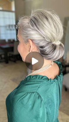 Missy on Instagram: "Edit- see the additional post on my profile for product info and tips and tricks for styling! 🤍 Bringing this one back! Chignon Tutorial!!! This is such an easy look to accomplish. Use a stretchy elastic headband  with a nonslip silicone strip and roll your hair around it. Add a decorative clip or comb and you have an elegant, easy hairstyle. If you find the hair and wants to slip, add a few bobby pins to secure it. What I love most about it is I can easily tighten or adjust the style by removing the comb and rolling the hair tighter. 🤍🤍🤍 Perfect for a wedding or a fancy dinner, or a day at work. * *  #bun  #chignons #updo #howtobeauty  #fauxchignon #chignon #howto #tutorial #hairstyletutorial #embracingthegray #gray #grey #longhair #naturalgrayhair #grayhair #grey Updos For Gray Hair, Updos Using Hair Combs, How To Style Long Hair For Work, Updos For Gray Hair Over 50, Diy Curly Updo Easy, How To Put Your Hair Up In A Clip, Gray Hair Updos Over 50, Grey Hair Updo Older Women, How To Put Hair Up