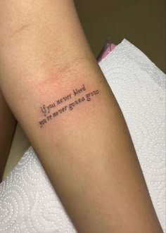 a woman's arm with a tattoo saying if you never had whatever grace