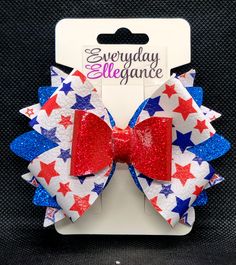 This hair bow was handmade using faux leather and a French barrette. 4th Of July Hair Glitter, Phillies Hair Bow Clip, Red White And Blue Cheer Bows, Silver Glitter Hair Bow, Pinwheel Bow, Glitter Stars