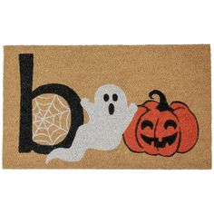 halloween door mat with ghost and pumpkins on it