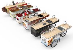 three food carts with different types of food on them