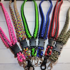 *What is it? - A custom made to order paracord lanyard featuring a breakaway buckle and a clip at the bottom to carry things, most commonly being your car keys. I offer two types of breakaways: the first type is a Side Release Buckle. This version will NOT break apart when pulled on. The second type is a Safety Breakaway and this version will breakaway when pulled on.  *This listing has a two week processing time. Need something faster? -Check out my ready to ship lanyards here:  https://www.etsy.com/shop/jackofallbraids/?etsrc=sdt§ion_id=37133118 *Like the idea of custom ordering, but want a different braid? Check out my Shark Jawbone Braid Lanyards here:  https://www.etsy.com/listing/1473117334/paracord-lanyard-breakaway-shark-jawbone *Sizing? -My lanyards are based on standard lanyards Knife Keychain, Knife Lanyard, Paracord Accessories, Paracord Ideas, Paracord Lanyard, Different Braids, Id Lanyard, Paracord Beads, Paracord Keychain