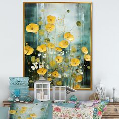 a bed with yellow flowers on it in front of a large framed painting above the headboard