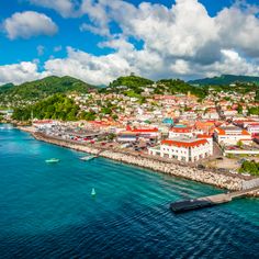 an aerial view of a small town on the water