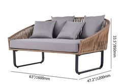 the measurements for a wicker sofa with grey cushions