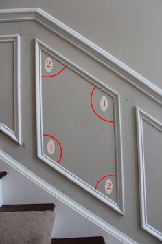 the stairs are marked with red numbers and numbered areas for each person to see in the mirror