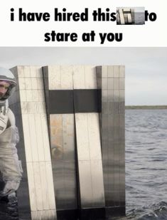 a man standing on top of a boat in the water