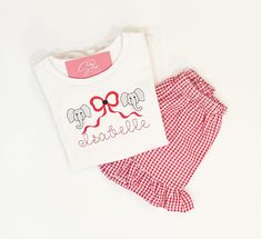 Cheer on your favorite team with this adorable spirit shirt!  The embroidered design is placed on a high quality white shirt/onesie. Shirts are 100% combed cotton and run true to size. Sizes range from 6 month-12. Brands used are Blanks Boutique or ARB Blanks depending on availability.  Please be sure to leave the name for personalization in the personalization box or message me with the name. Please ensure that you are choosing the correct sizing and that the name is spelled correctly when submitting your order.  If you wish you choose a different font or thread color than pictured, please message me and let me know which font and or thread color you would like otherwise the design will be printed exactly as the sample appears.  Please note colors may vary slightly due to lighting and/or Preppy Cotton Tops With Letter Print, Preppy White Crew Neck T-shirt, White Preppy Crew Neck T-shirt, White Cotton Preppy T-shirt, White Crew Neck T-shirt, Preppy Style, School Spirit Cotton Top With Custom Embroidery, White School Spirit Shirt With Name Print, Cute Personalized Cotton Shirt, Personalized Cute Cotton Shirt