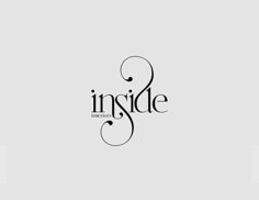 the inside magazine logo is shown in black on a gray background with an elegant swirl design