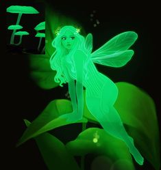 a green fairy sitting on top of a leaf