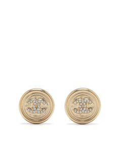 circa 2000s gold-tone metal signature interlocking CC logo rhinestone embellishment post-back fastening for pierced ears These earrings come as a pair. POSITIVELY CONSCIOUS: Purchasing this item continues its narrative and reduces the environmental impact of using new resources. You can be confident that you’re making a better choice for the Planet. 2000s Chanel, Extravagant Earrings, Coin Earrings, Chanel Earrings, Shopping Chanel, Chanel Jewelry, Cc Logo, Environmental Impact, Pierced Ears