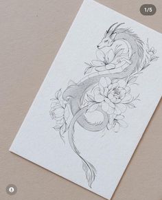 a drawing of a dragon with flowers on it