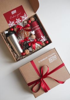 a christmas gift box with coffee and cookies