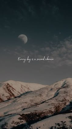 the moon is in the sky above some snowy hills and mountains with words written on it