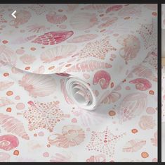 an image of a wallpaper with pink flowers and leaves on it, next to another photo