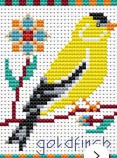 a cross stitch pattern with a bird on it