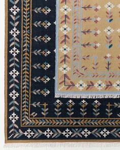 an area rug with various designs and colors