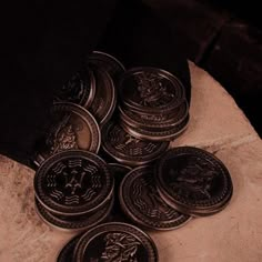 a pile of coins sitting on top of a table