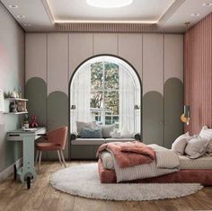 a bedroom with an arched window and wooden floors