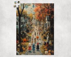 a jigsaw puzzle with people dressed as witches and pumpkins on the street