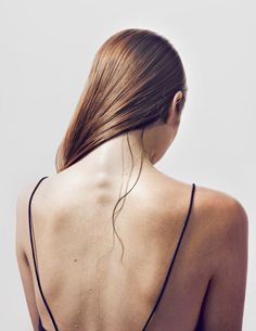 the back of a woman's body with long hair