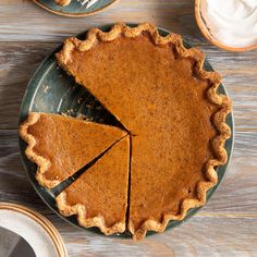 a pie sitting on top of a green plate