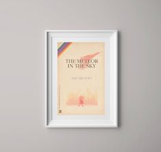 a framed book cover with the title'the mirror in the sky'on it