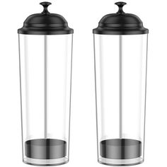 two clear glass containers with black lids on white background stock photo - 1387982