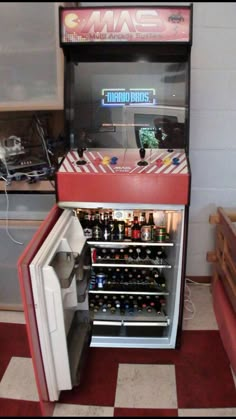 an open refrigerator with drinks inside of it