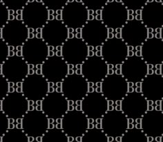 a black and white pattern with the letter b on it's backgrund